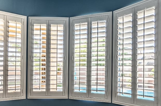 Bow window with plantation shutters
